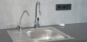 Modern kitchen. Faucet and sink